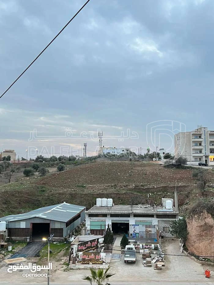 أرض في قم-الوسطية بقرب شارع الستين - 102,000 دأ - صورة 1